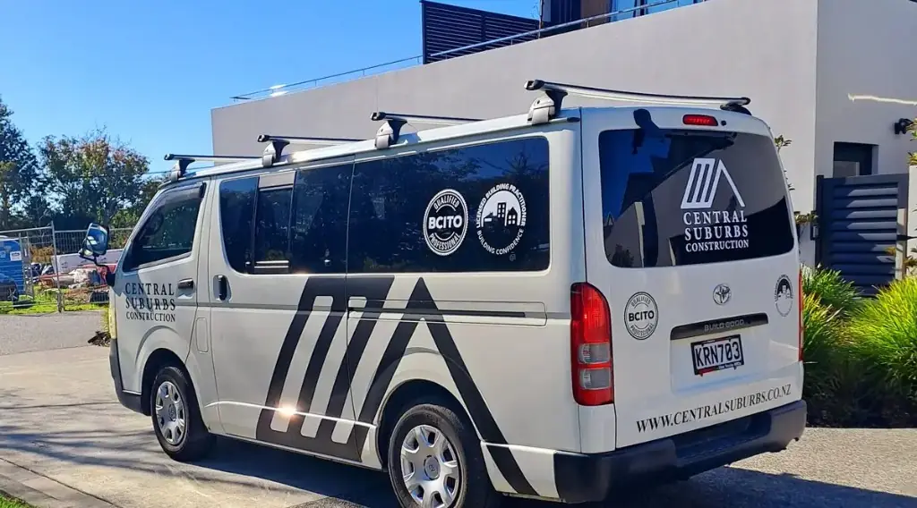 Central Suburbs Construction branded van parked at a residential build site